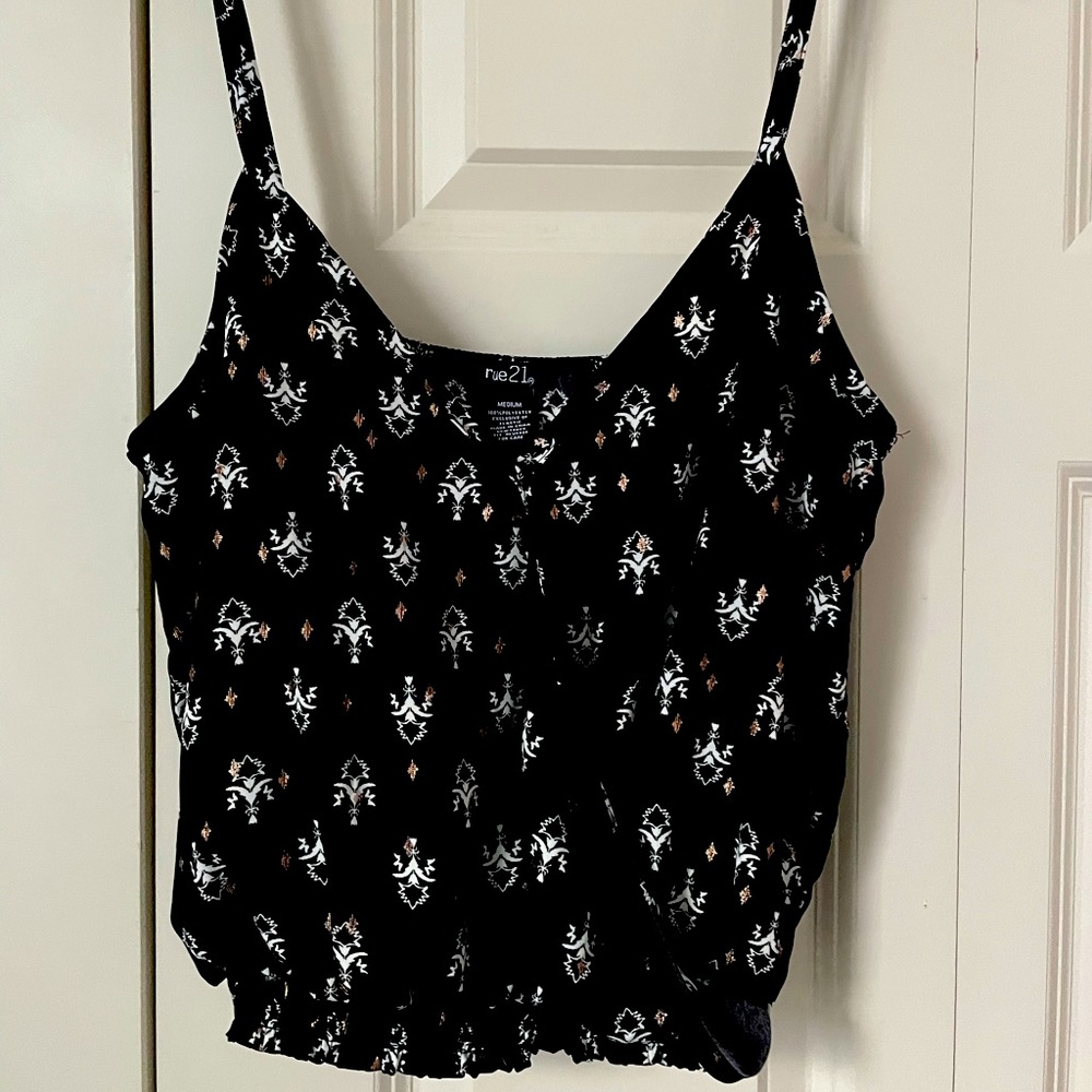 gold and black top